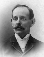 portrait photo of Percy W. Wood