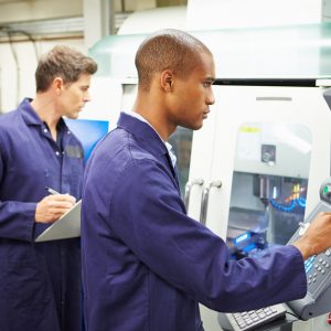 Technology Professionals Insurance - Men at work in a high tech laboratory.